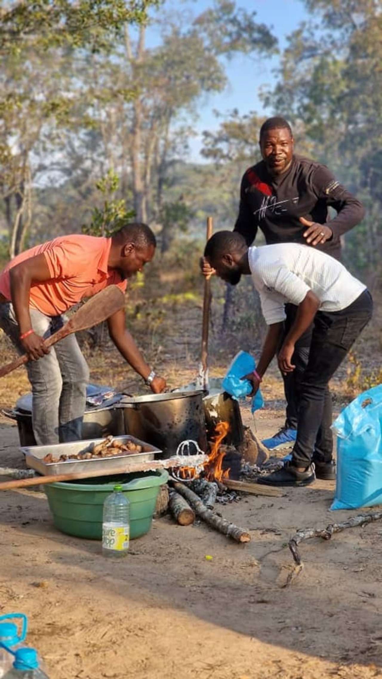 PICS| Humble Prophet Walter Magaya Touches Hearts with Acts of Service: Cooking Sadza for Faithful Congregants